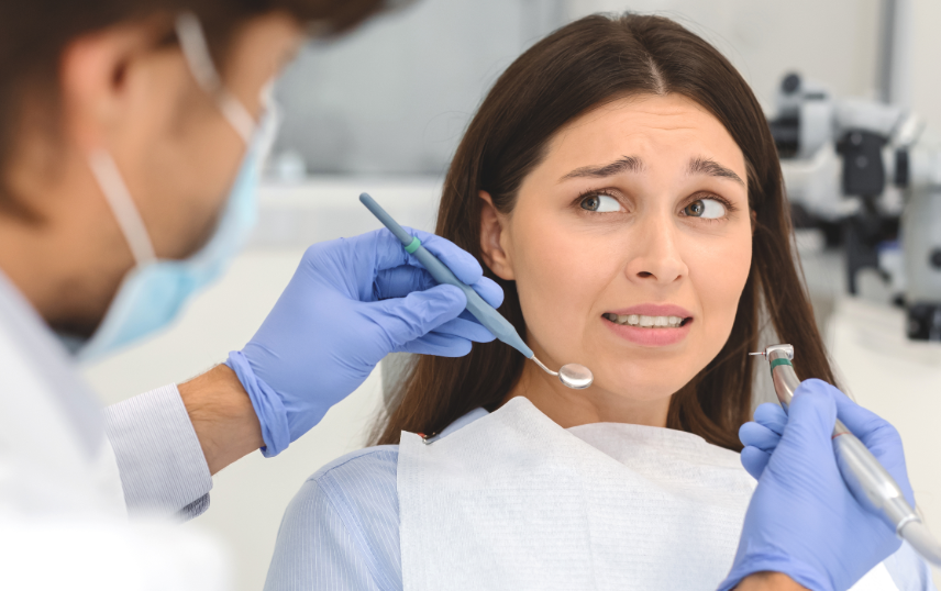 Patient looking scared at dentist